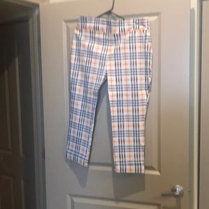 3 piece set.. top is long in back, ankle pants and thigh high short..